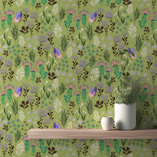 Butterfly meadow green wallpaper with a whimsical floral and leaf pattern.