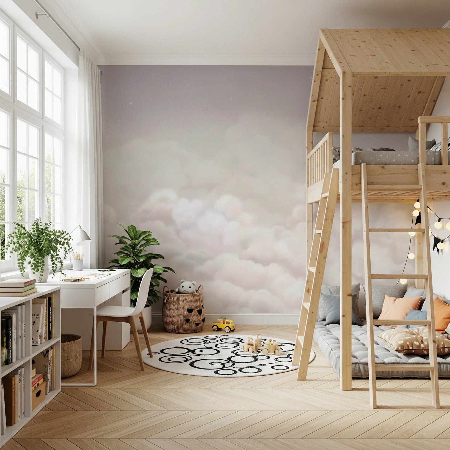 Pink cloud wall mural in a bright nursery featuring a wooden loft bed and desk.