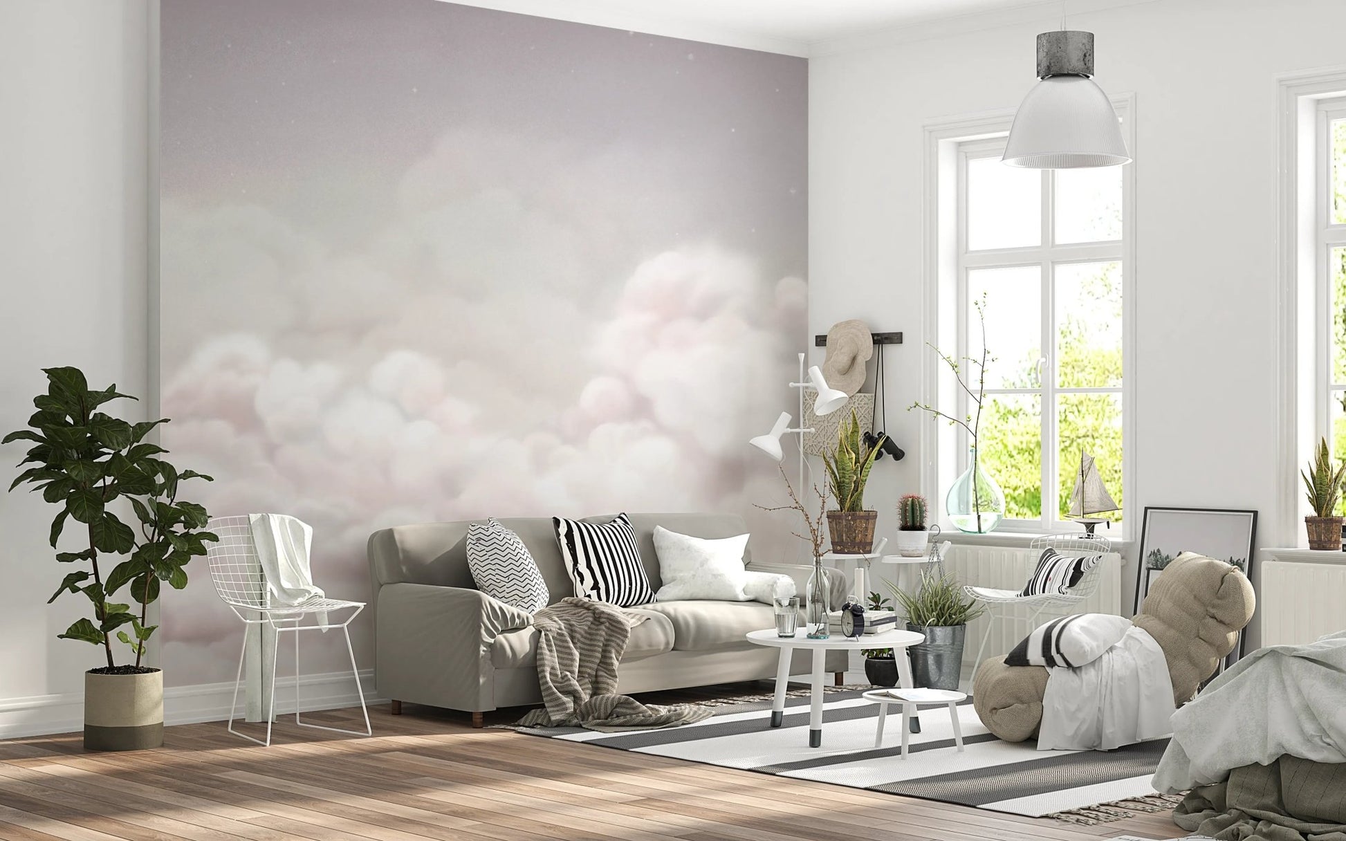 Dreamy pink sky wall mural in an open plan living space with a grey sectional.