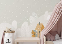 Bedroom corner with a pink canopy and soft grey mountain wall mural.