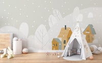 Playroom setup with a white teepee tent and mountain landscape wall murals.