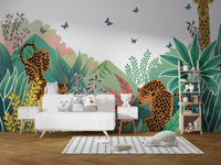 Jungle themed safari wall mural behind a white sideboard and striped rug in a playroom.