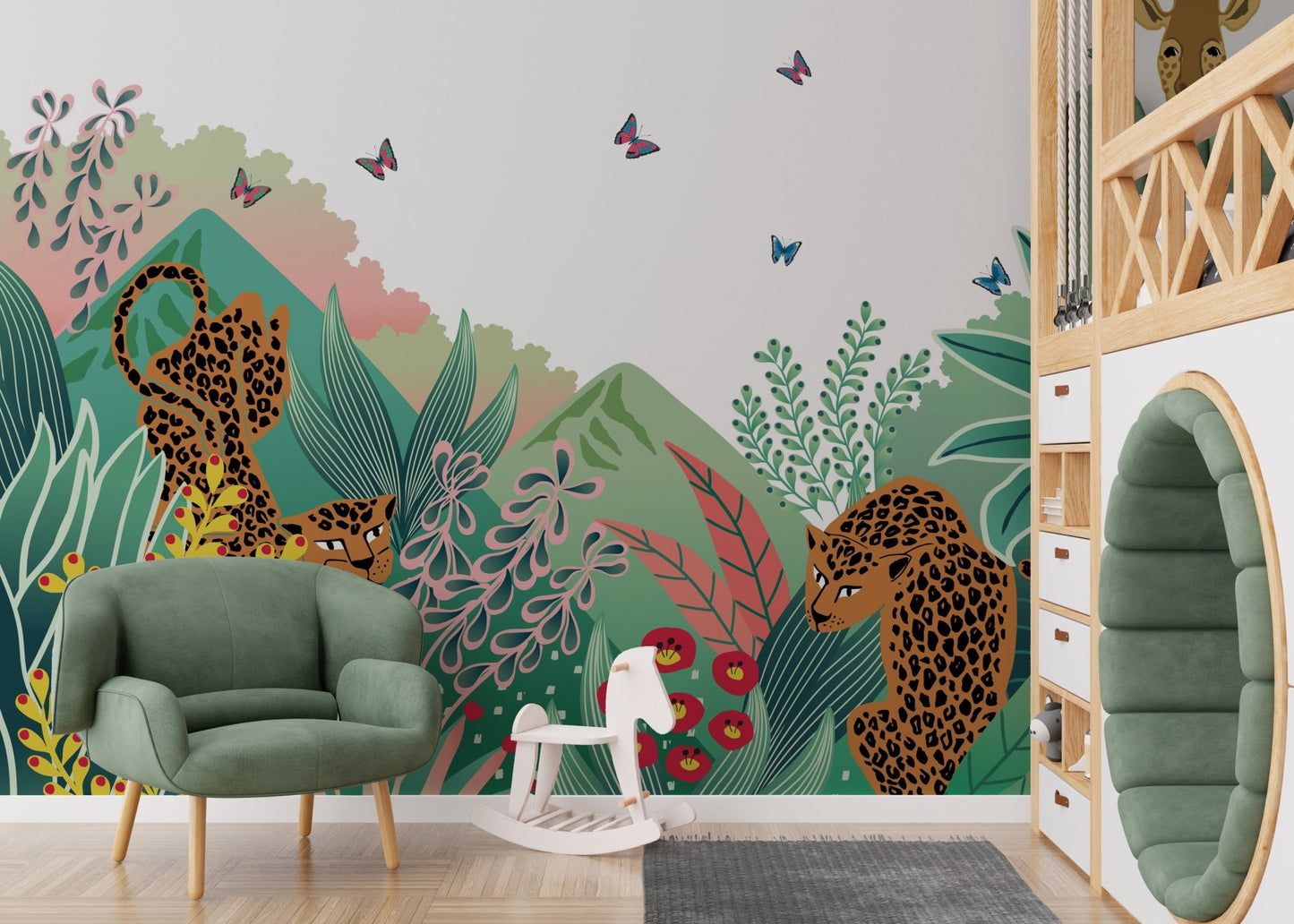 Cartoon Safari Tales wall mural in a modern room with a green armchair and toy horse.