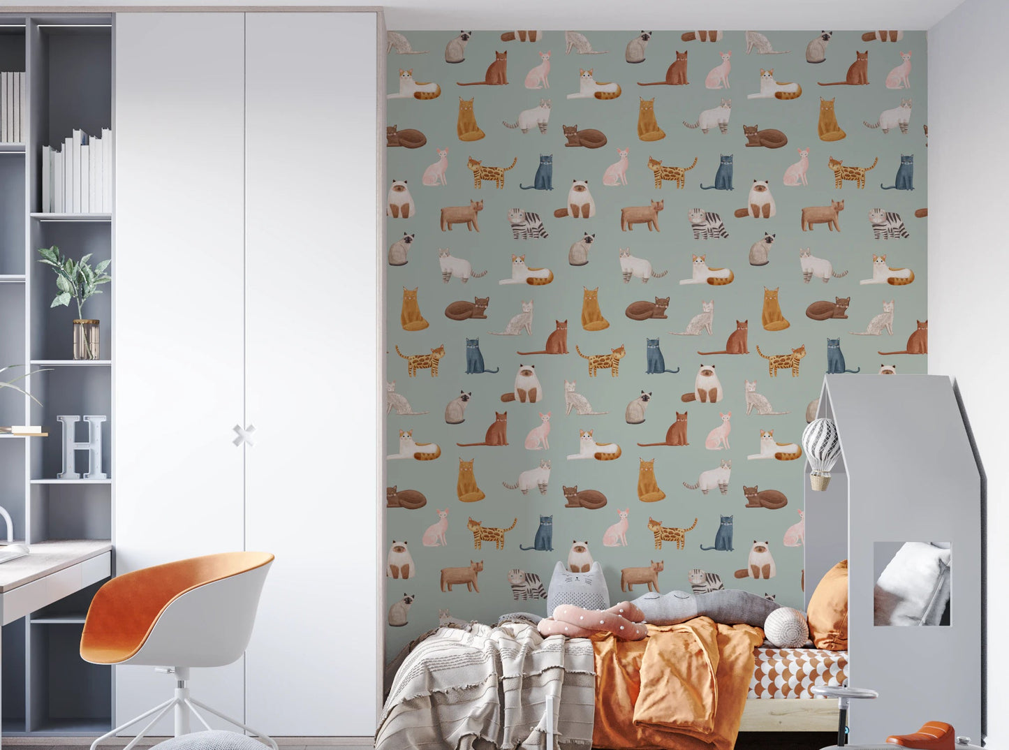 Cute kittens in various poses on a pastel green surface.