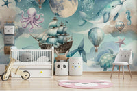Dreamy ocean and sky mural in a neutral-toned nursery