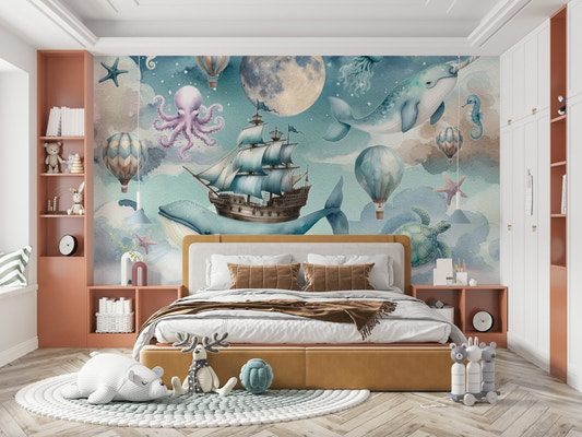 Whales swimming among golden stars in a blue celestial sea adventure wall mural.
