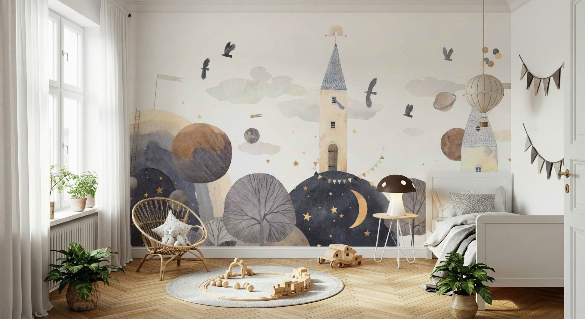 Nursery wall decor featuring soft moon and turret details.