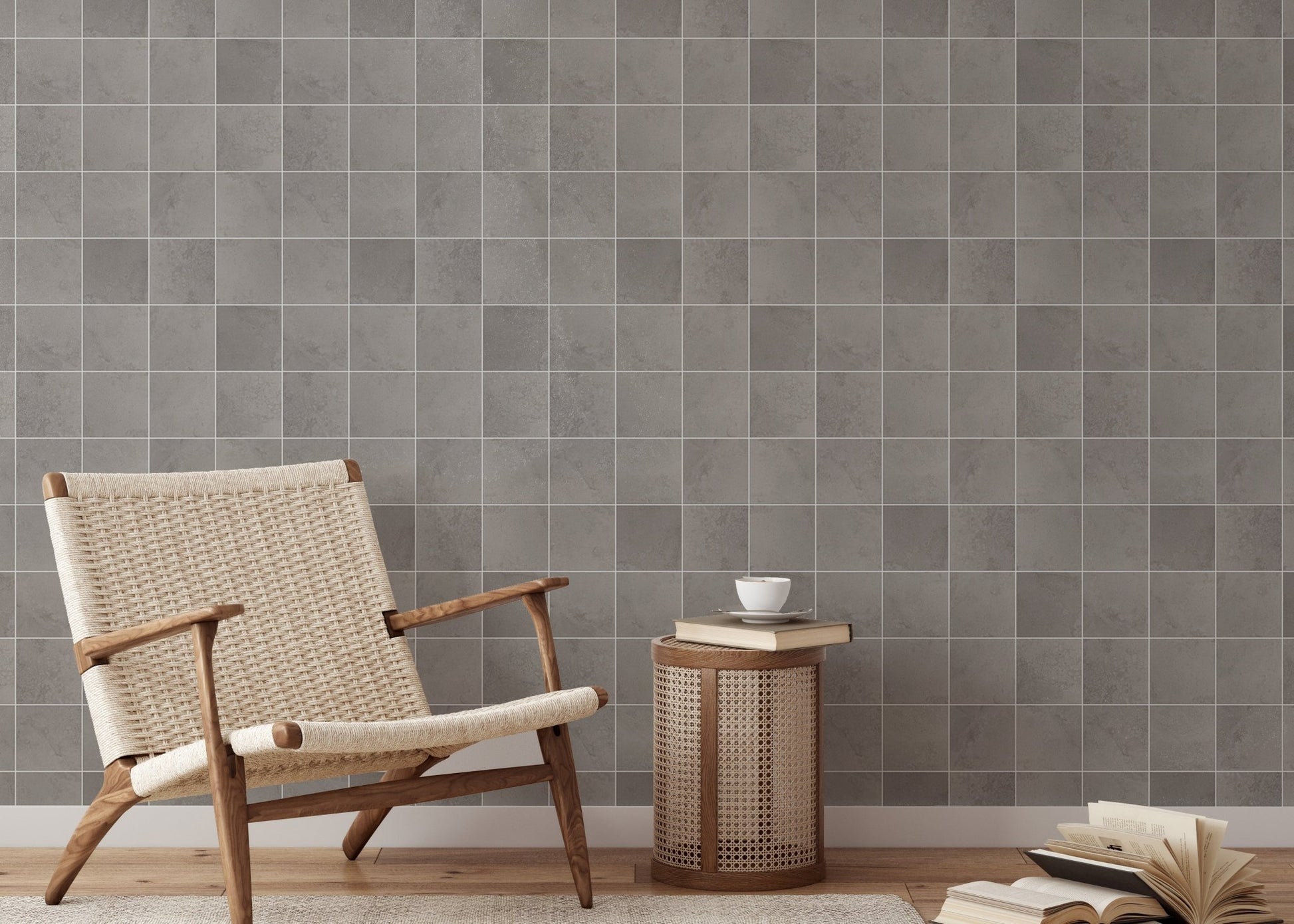 Textured ceramic grey tiles wallpaper in a reading area with a wooden chair.