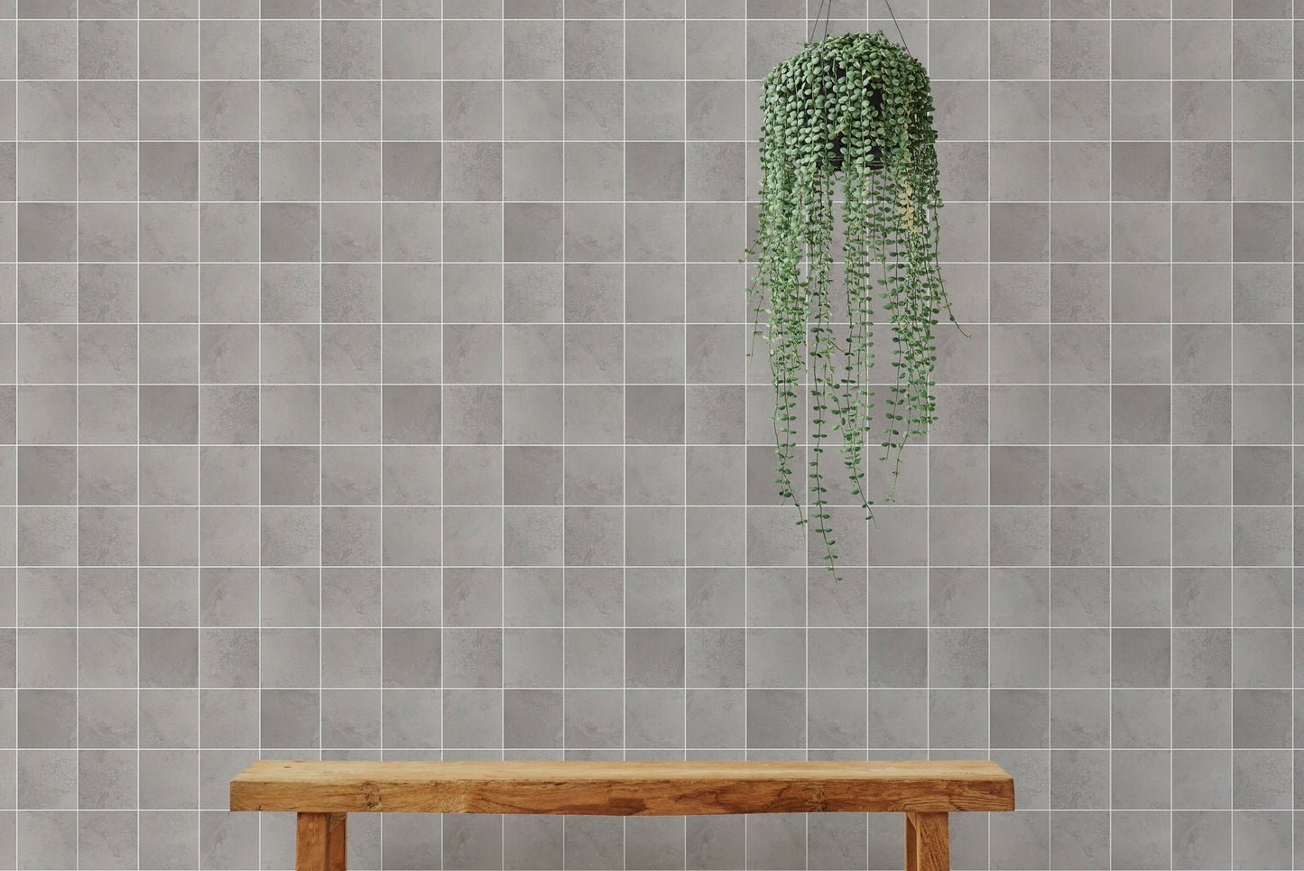Ceramic grey color tiles seamless pattern wallpaper with hanging plants.