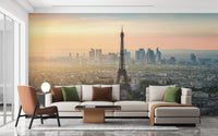 Sophisticated living area featuring a Paris skyline wallpaper mural.