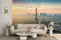 Living room aesthetic enhanced by a Parisian sunset wall mural.