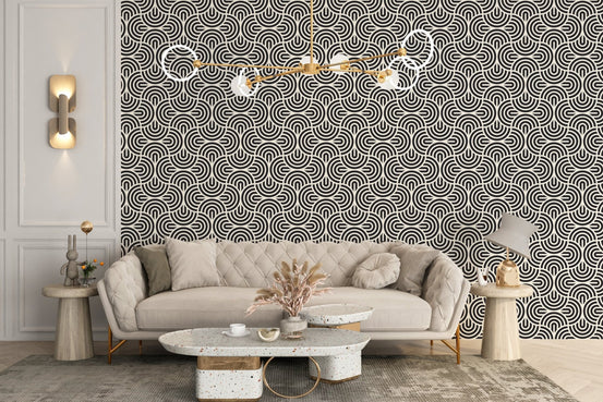 Beige sofa against a grey Chinese Spiral Patterns wallpaper.