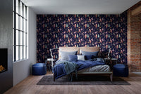 Bedroom wall mural featuring artistic festive figures on dark blue.