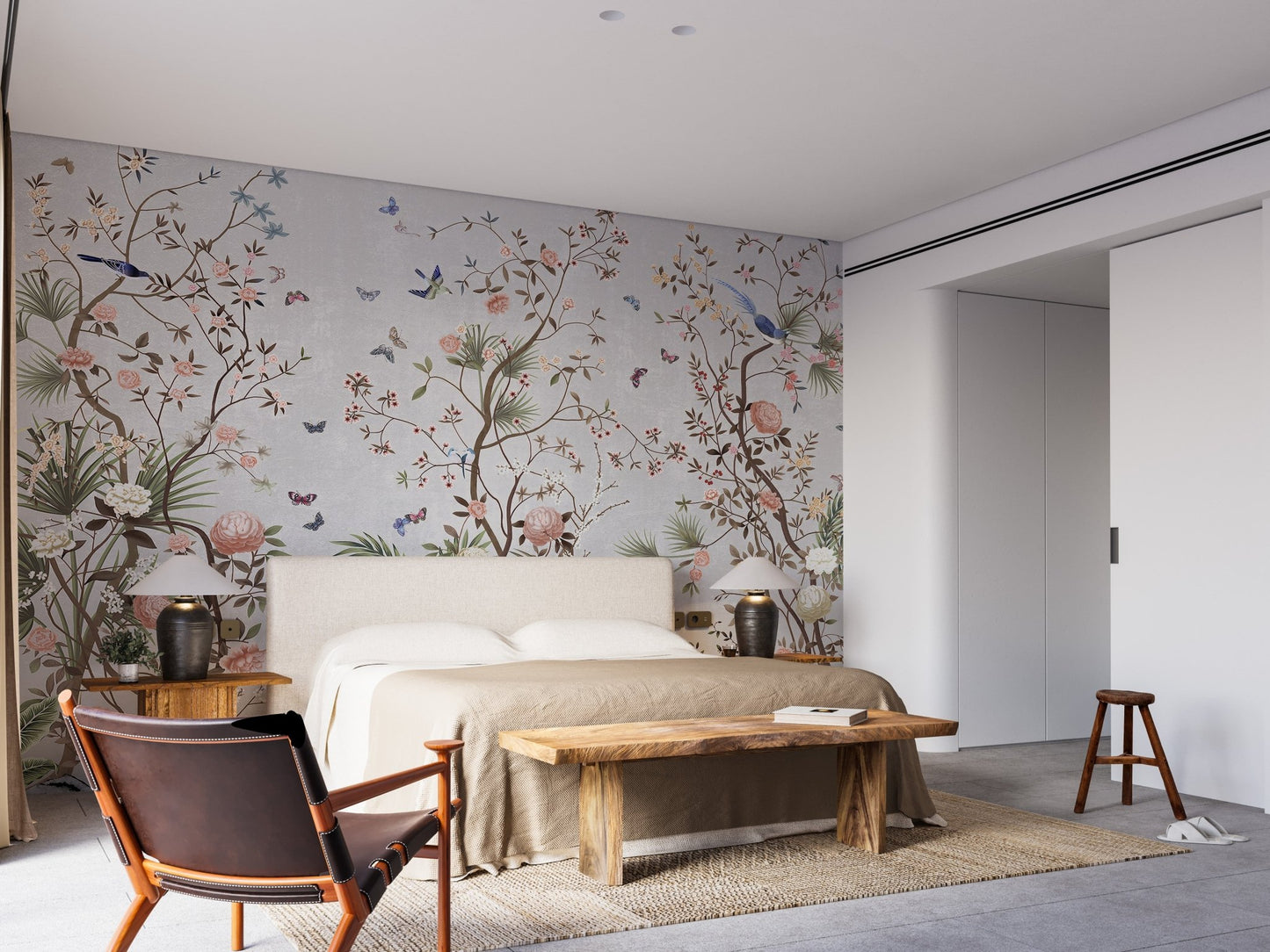 Nature inspired chromatic wall mural in a guest room with a wooden bench and chair.