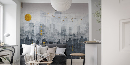 City Reflections Wall Murals featuring a grey skyline behind a dark sofa.