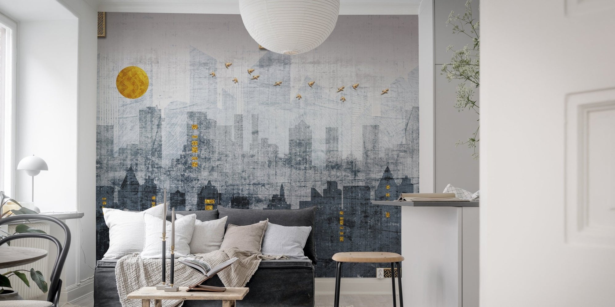 City Reflections Wall Murals featuring a grey skyline behind a dark sofa.