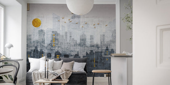 City Reflections Wall Murals featuring a grey skyline behind a dark sofa.