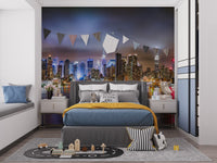 Vibrant New York skyline wall mural in a kids' bedroom with a blue bed.