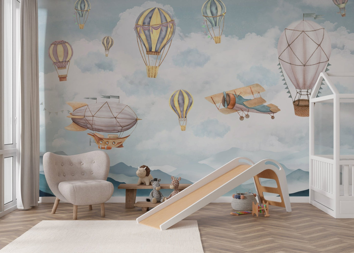 Hot air balloons wall mural with zeppelin soaring over dreamy, foggy mountains.