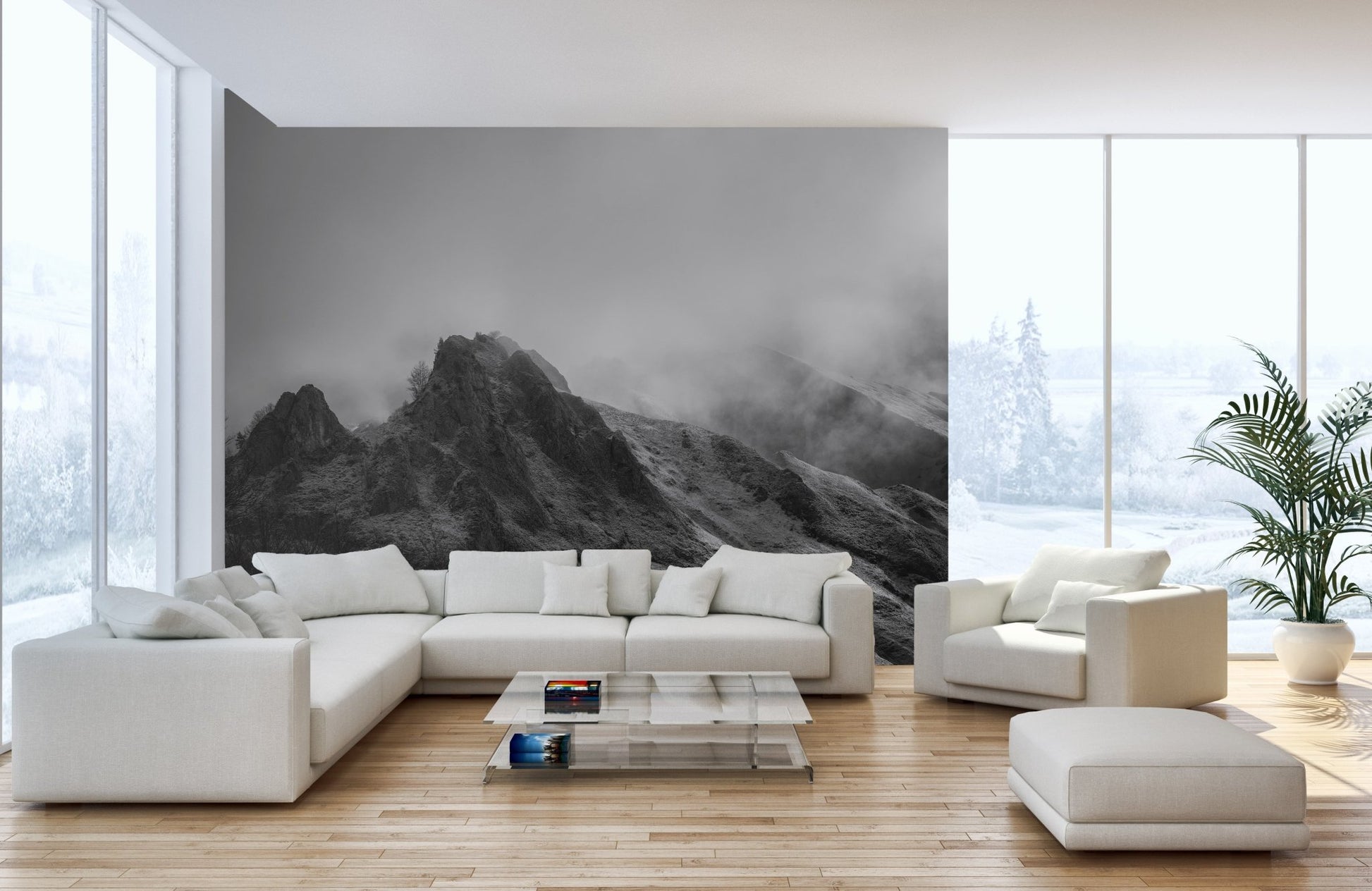 Minimalist living room featuring grey mountain wall mural and a white sectional sofa.