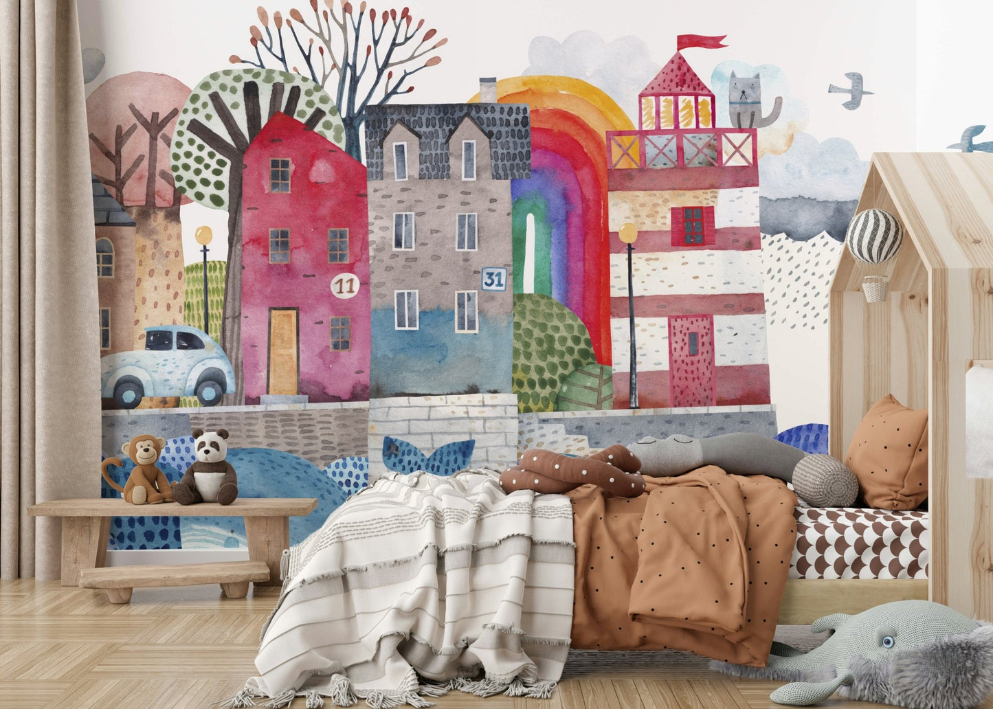 Bold maritime scene on a large feature wall in a beach house.