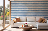 Coastal Watercolor Stripes wallpaper in a living room with soft hues.