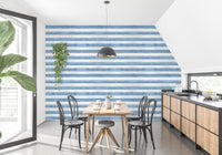 Breezy and modern watercolor stripes wallpaper perfect for dining walls.