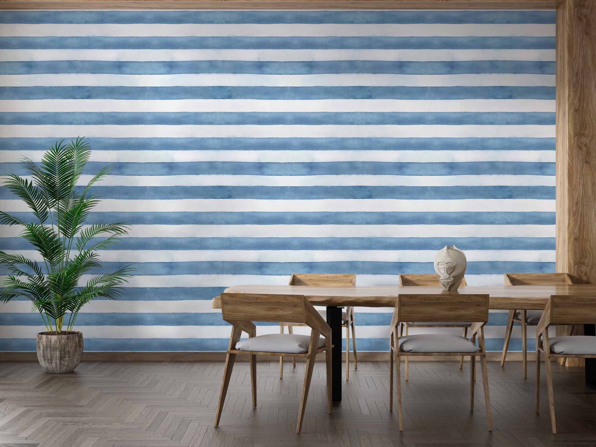 Peaceful beach vibes with Coastal Watercolor Stripes wallpaper in dining area.