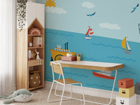 Coastline wonder mural with soft waves and sandy shores in kids study area.
