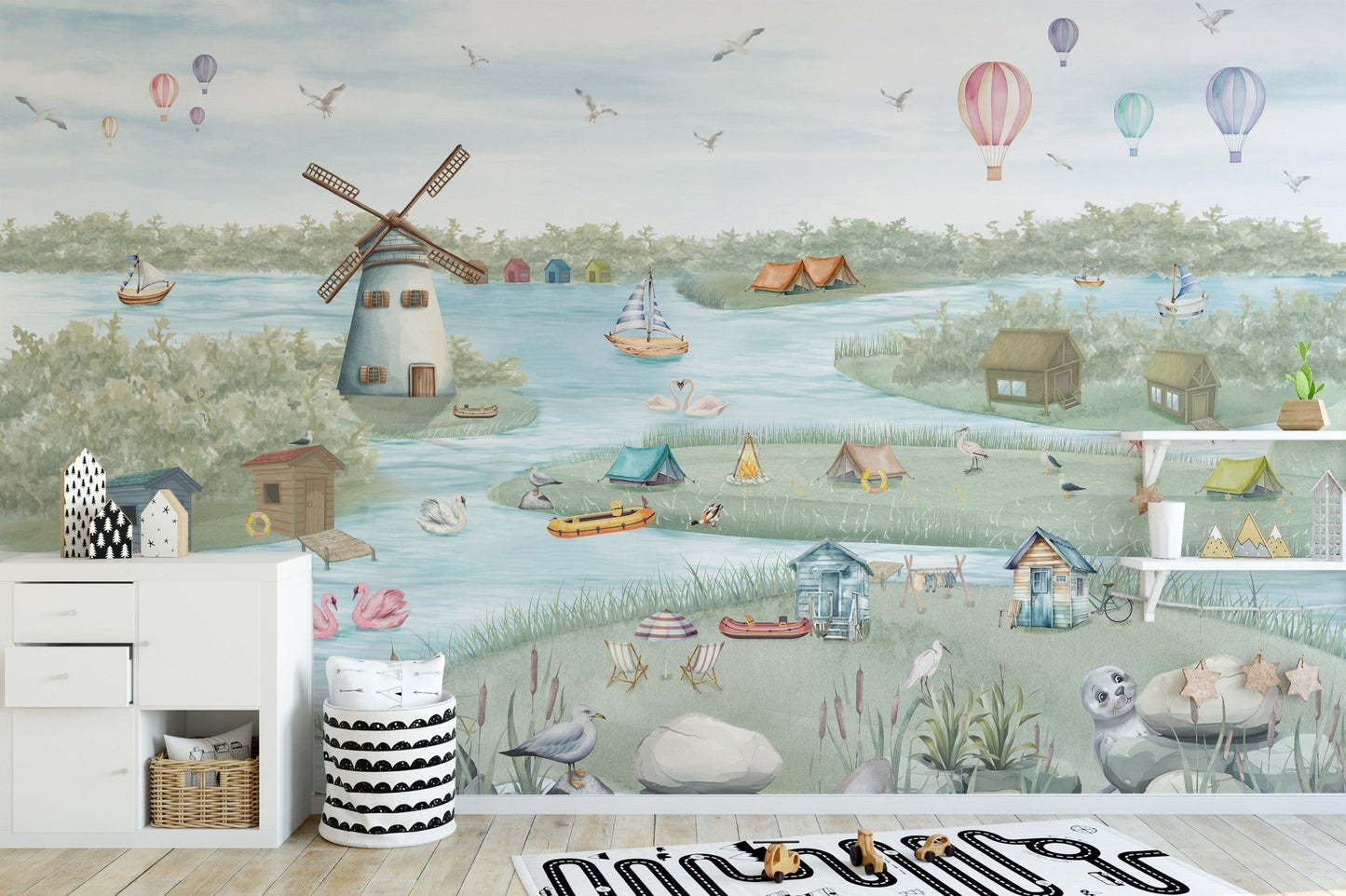 Lakeside wallpaper mural with swans, cabins, and soft blue water.