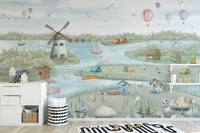 Lakeside wallpaper mural with swans, cabins, and soft blue water.