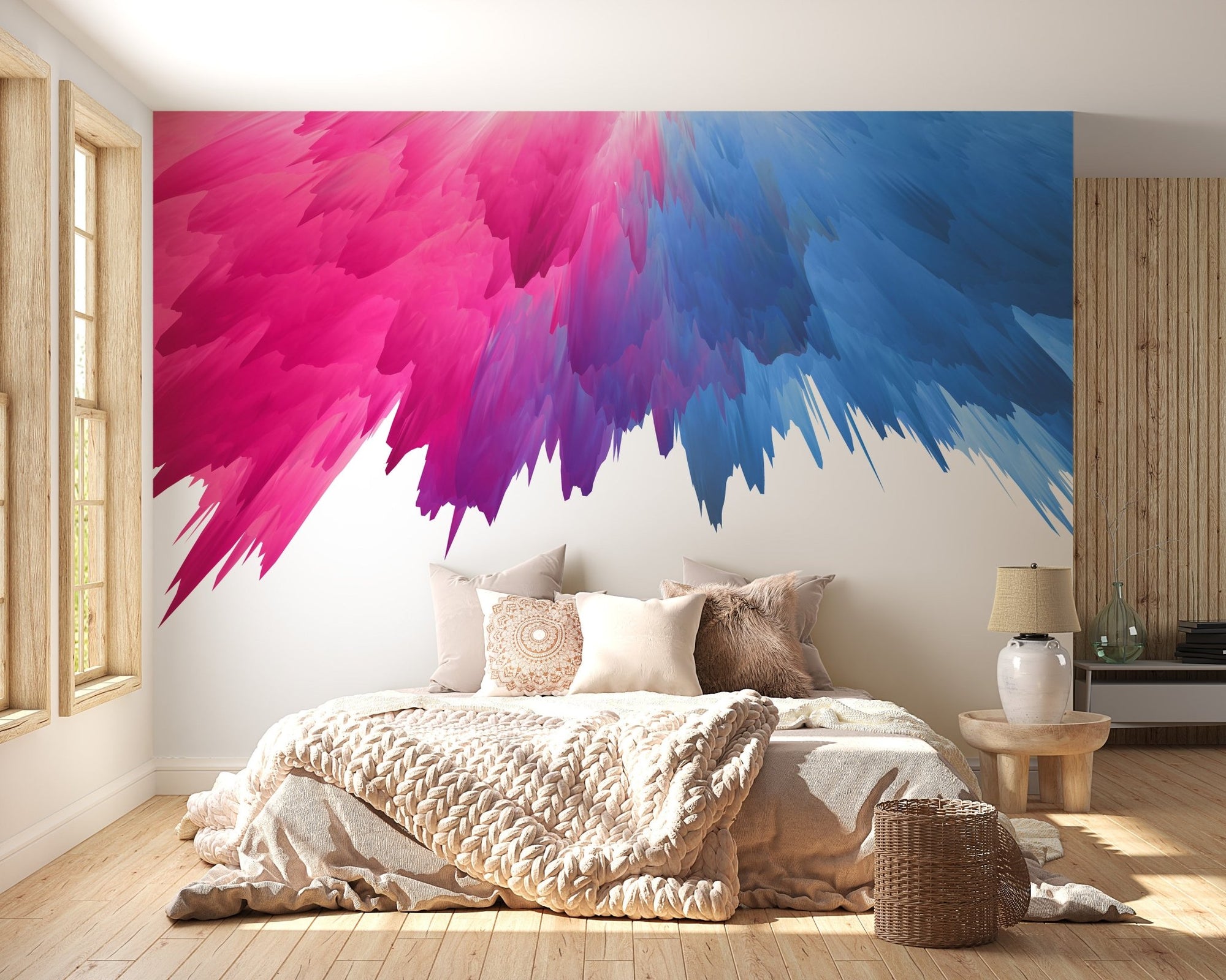 Pink and blue joy wall mural in a bright bedroom with a large wooden bed.
