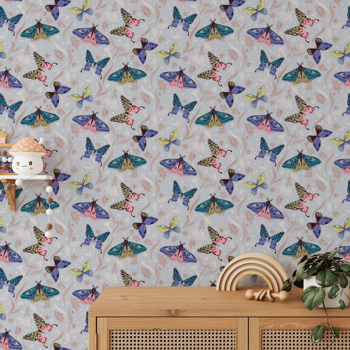 Pastel hued butterfly wallpaper with delicate botanical line art elements.