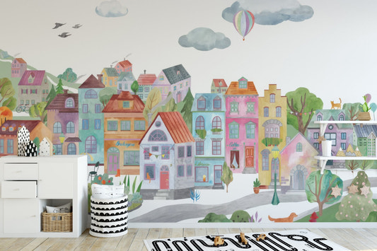 Colorful cityscape wall mural with pastel town houses wallpaper.