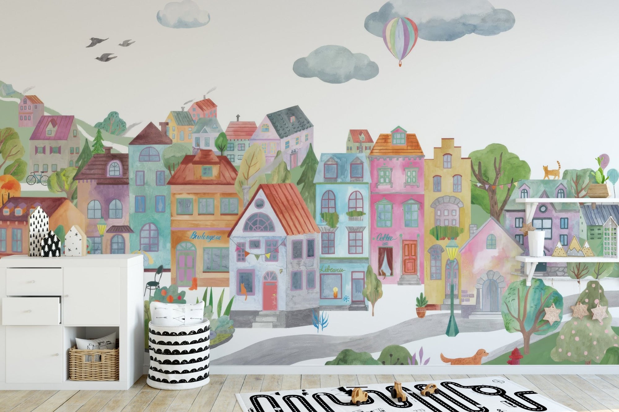 Colorful cityscape wall mural with pastel town houses wallpaper.
