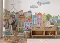 Watercolor city homes wallpaper with balanced color accents.