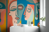 Vibrant face art wall mural for a contemporary interior design project.