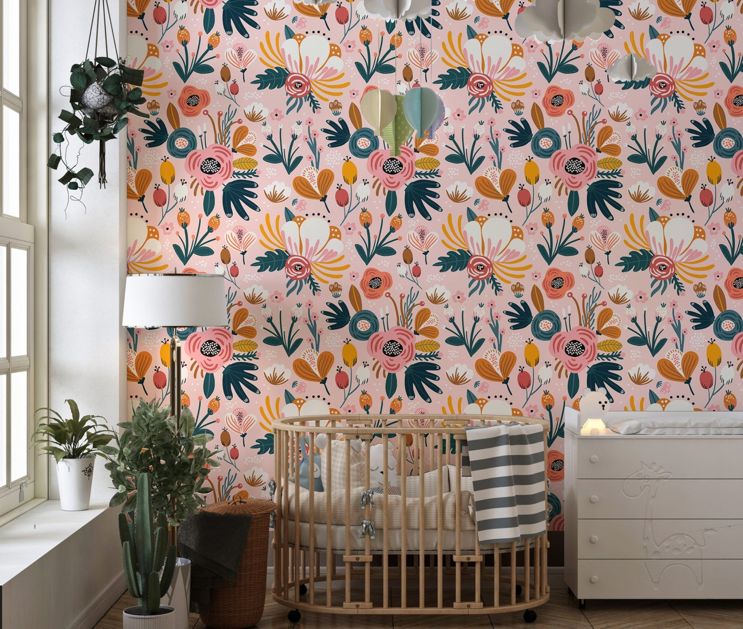 Colorful flower seamless pattern pink background wallpaper in nursery with wooden crib.
