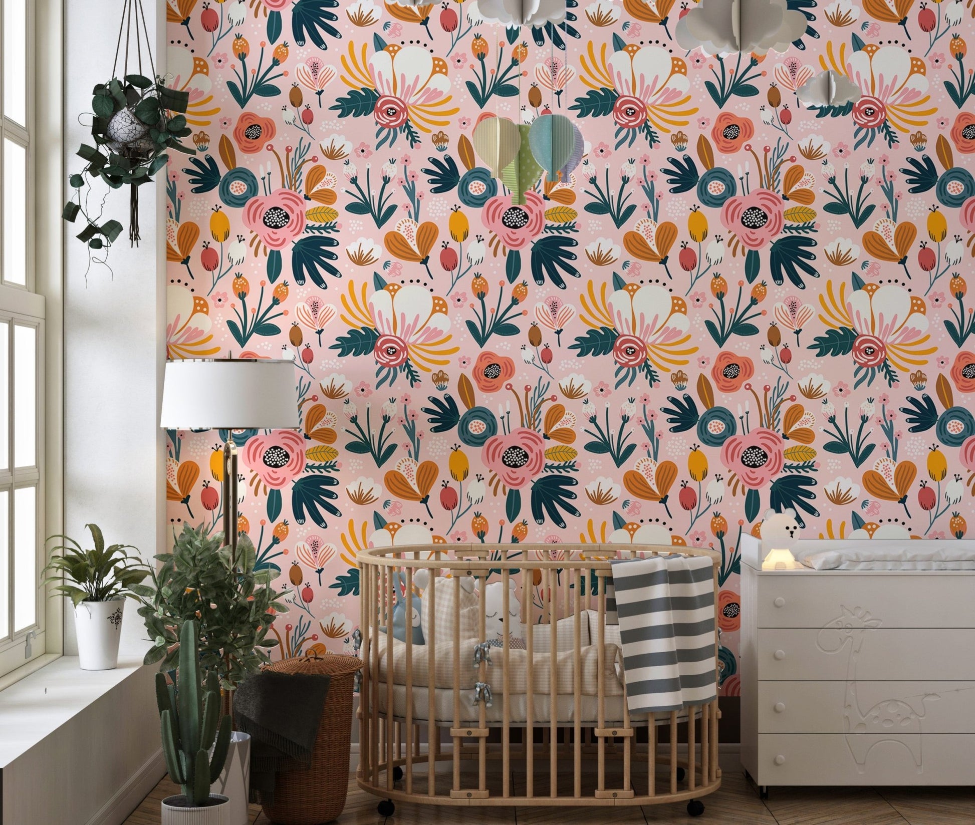 Colorful flower seamless pattern pink background wallpaper in nursery with wooden crib.