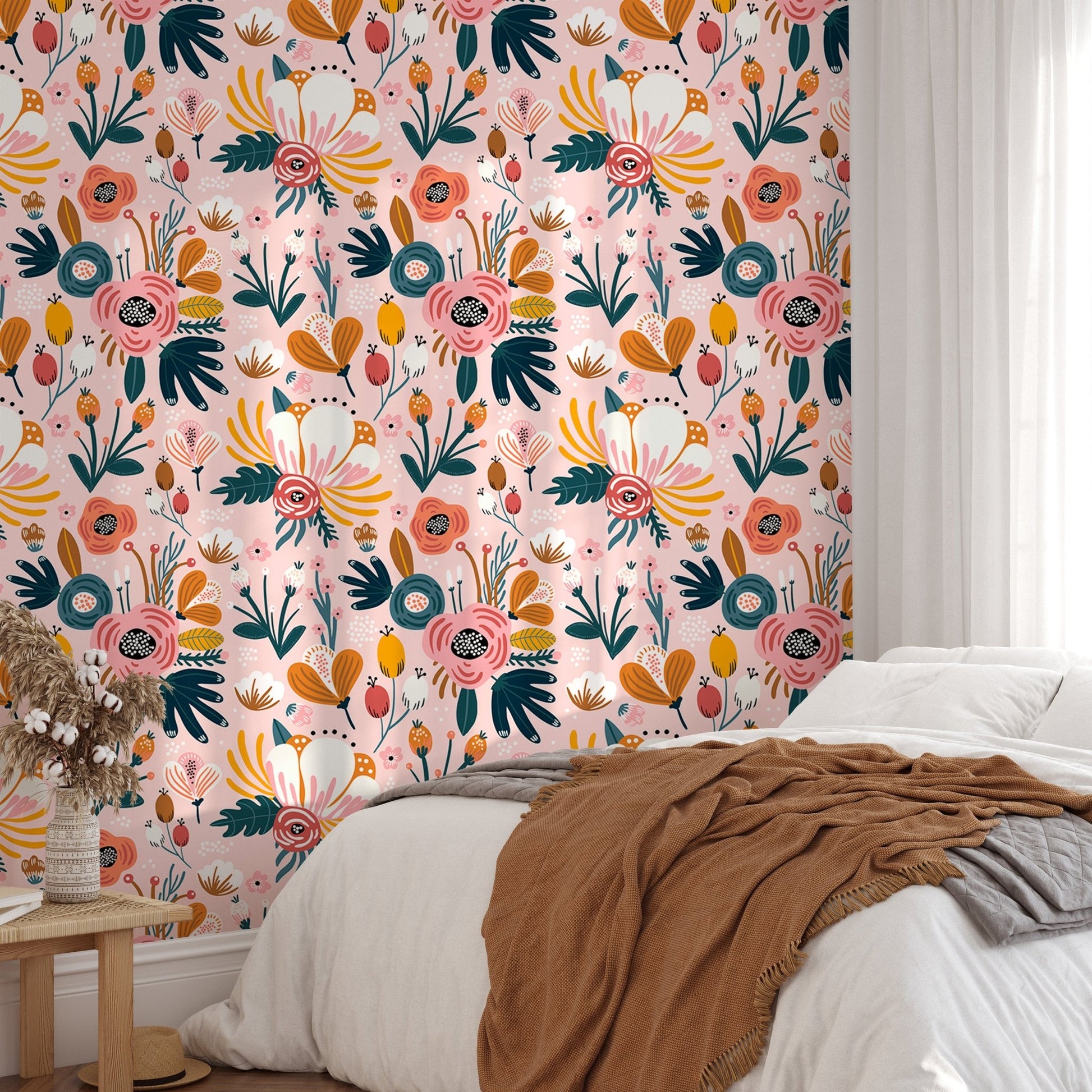 Pink background floral wallpaper behind a minimalist bed with white pillows.