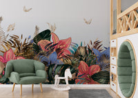 Green and pink leaf garden wall mural in a living room with a green armchair.