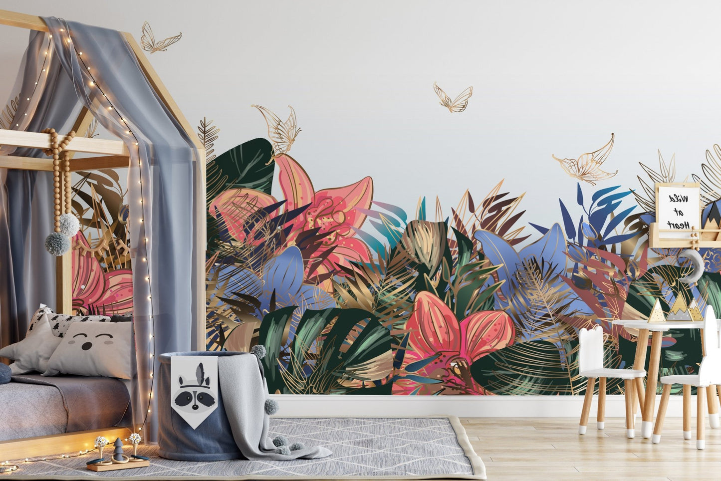 Garden style wall mural in a bedroom featuring a grey upholstered bed.