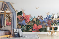 Garden style wall mural in a bedroom featuring a grey upholstered bed.