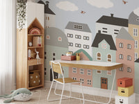 Vibrant houses wall mural for a cheerful kids study space.