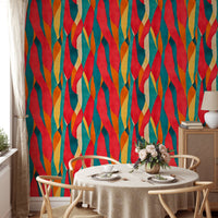 Colorful Irregular Artistic Dyed Striped Wall mural in a dining space with round table.