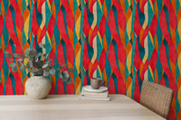 Artistic Dyed Striped Wall mural behind a desk with green plants and books.