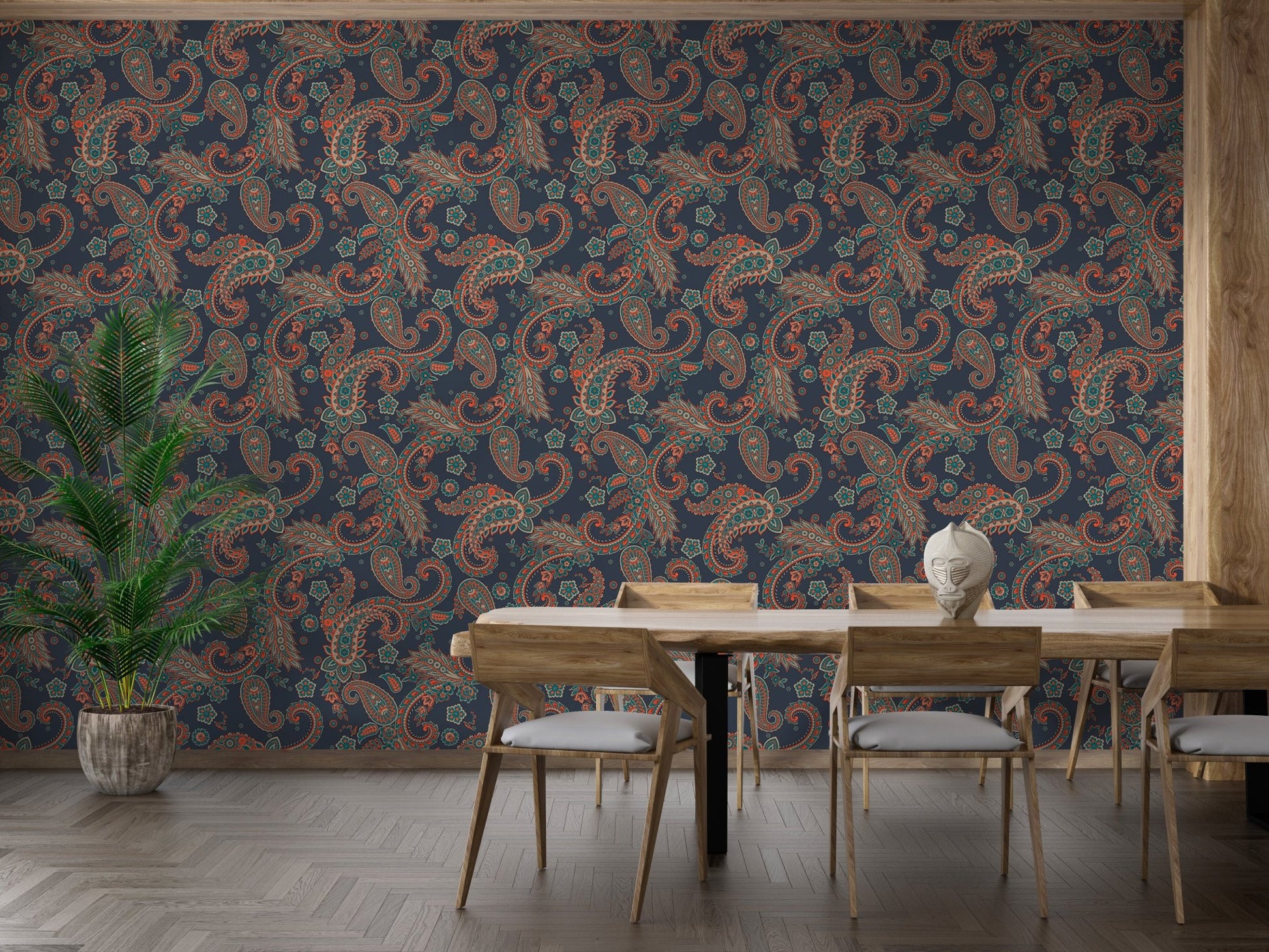 Large scale wallpaper in a dining space with a wooden table and black chairs.