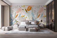 Elegant master suite with soft leaf pattern wall mural behind a grey bed.