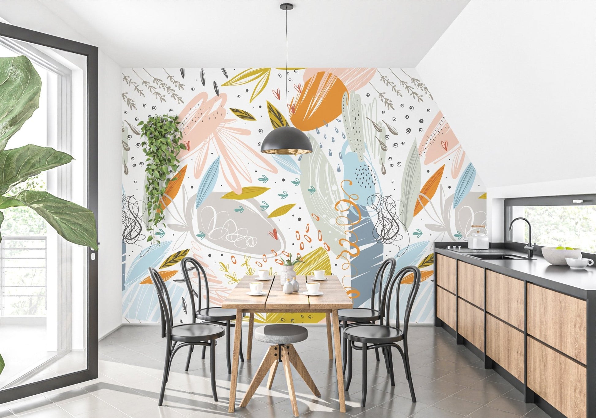 Bright dining area featuring abstract leaf wall mural behind wooden table.