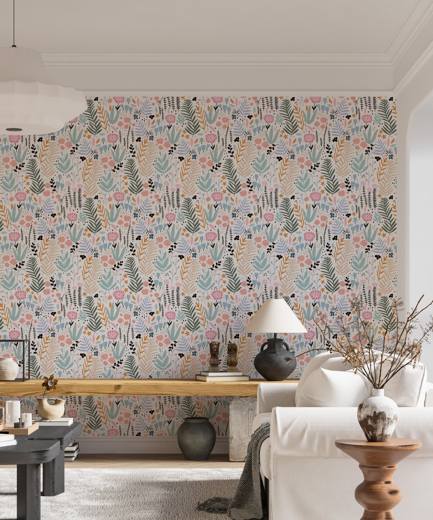 Living room with Colorful Leaves and Flower Repeat Pattern Wallpaper and white sofa.